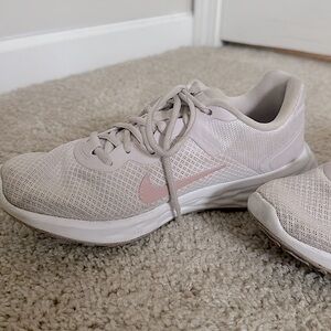 women’s Nike baby pink running shoes